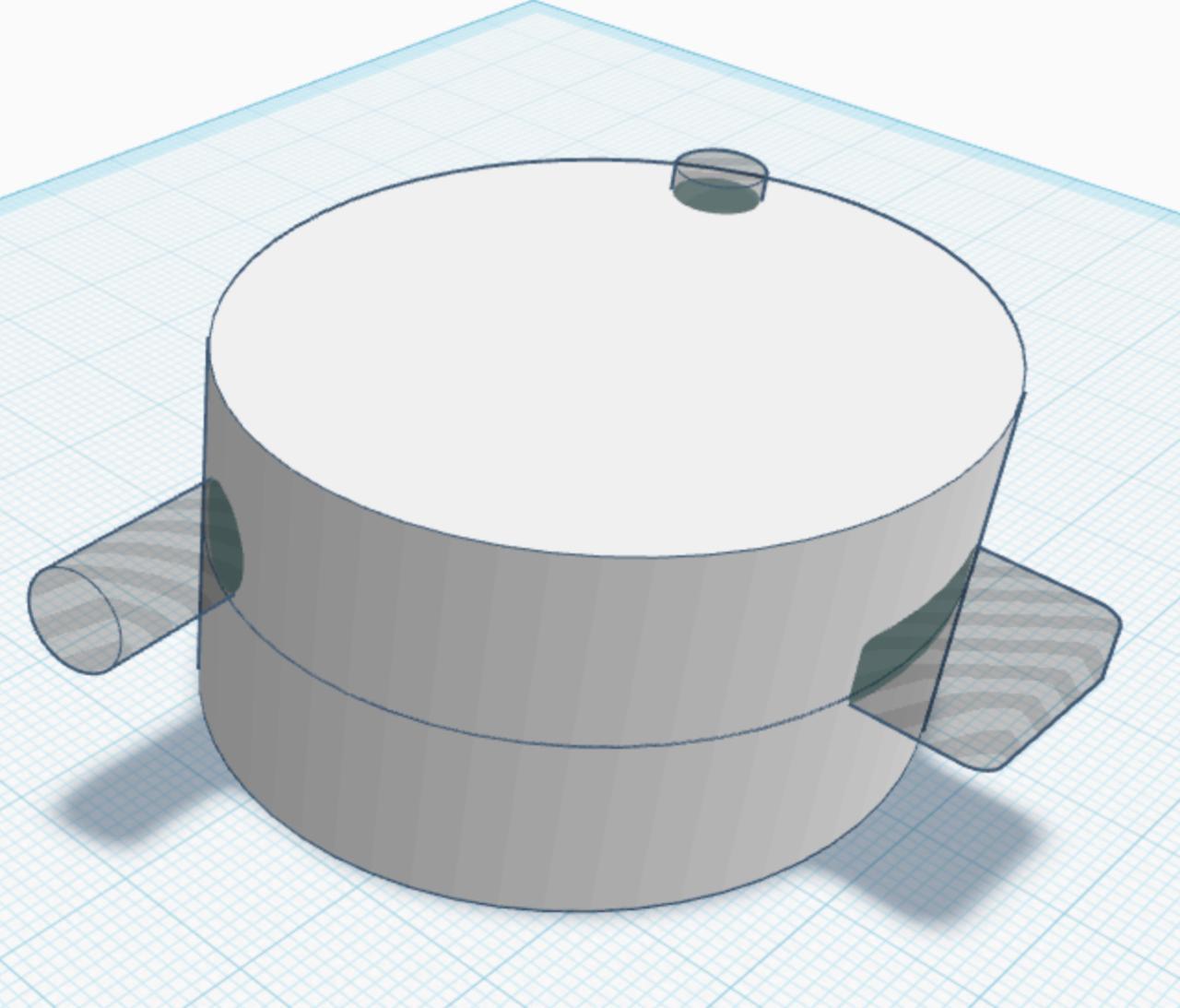 A CAD render of a round, puck-shaped casing with translucent cutouts marking the internal components